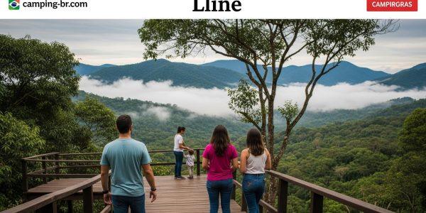 Campers setting up tents along a Brazilian lakeside trail at sunrise with forest backdrop.